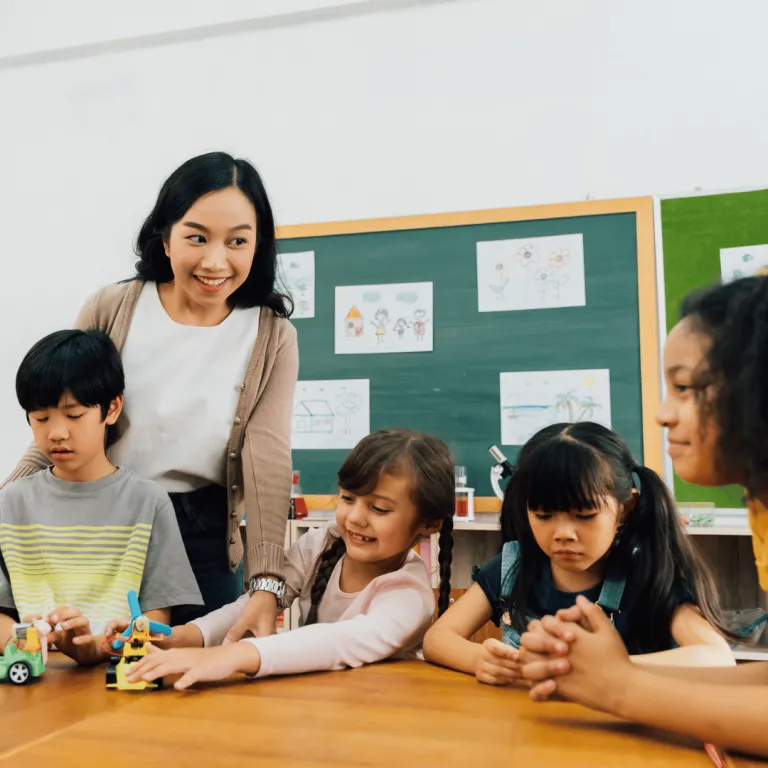 teacher teaching and interacting with students