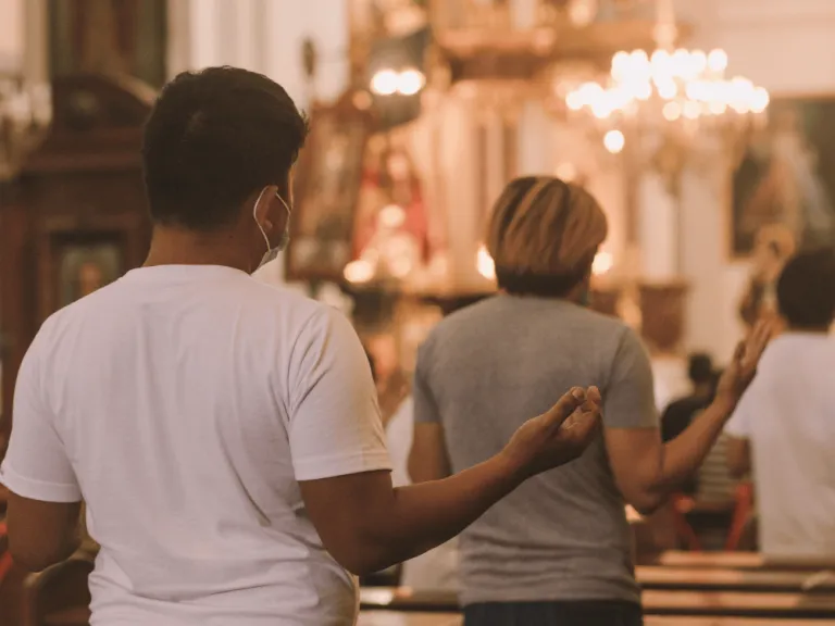 filipino worshipping inside the chruch