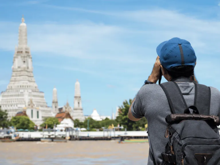 asian traveller taking photos in thailand