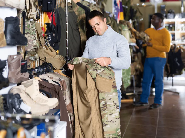 man looking to buy camouflage clothing