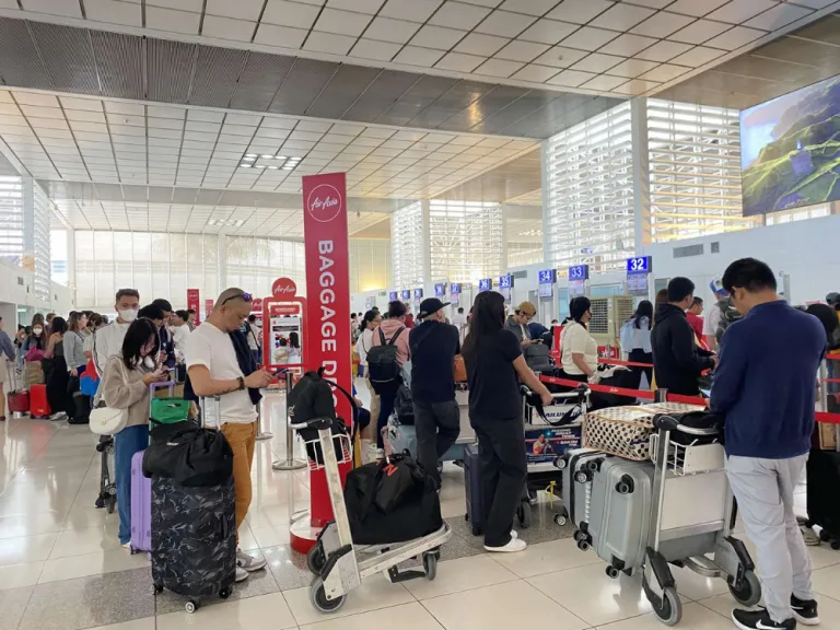 people at the airport air asia